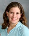 E. Herman