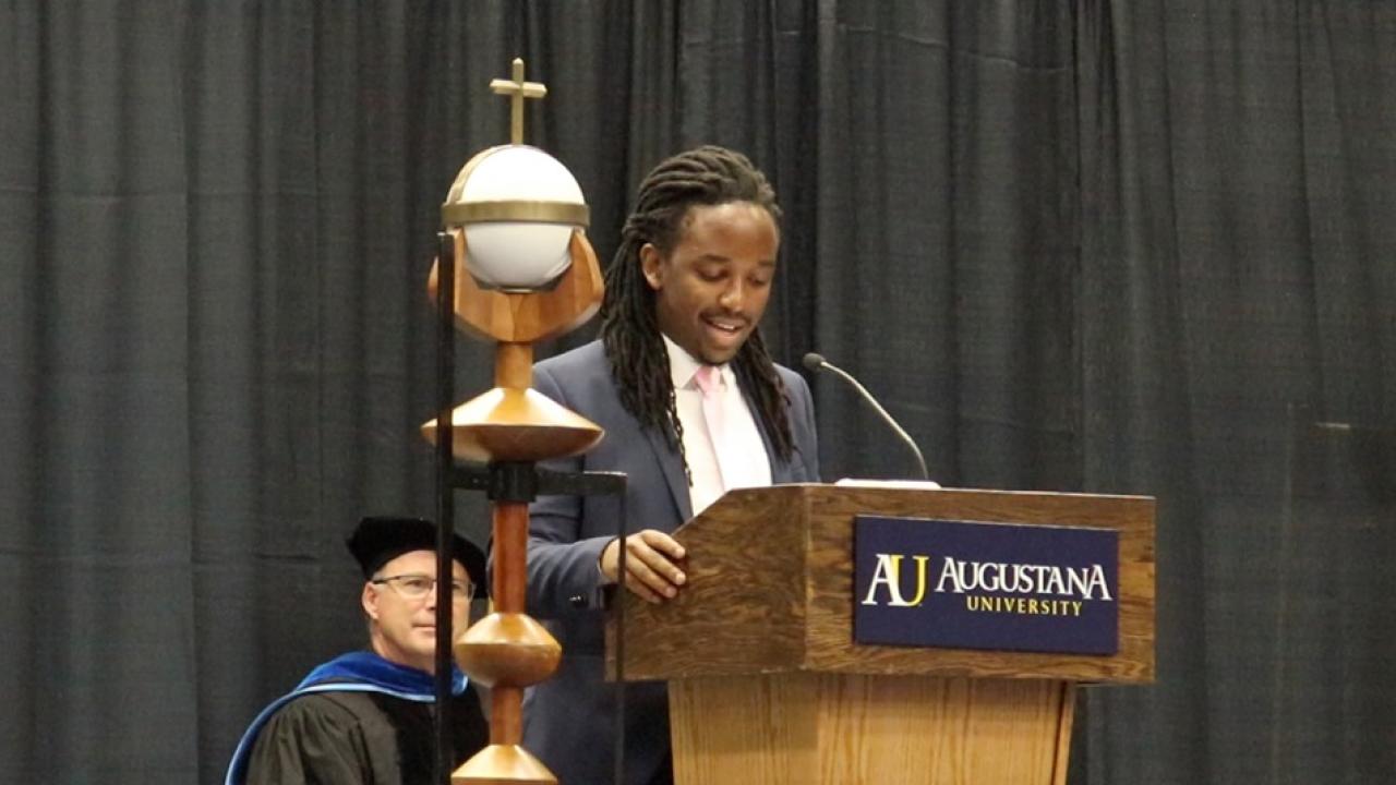 Luca Amayo delivering a speech during opening convocation, 2019