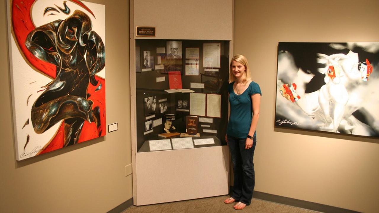 Rachel Carsrud with exhibit on John R. Milton