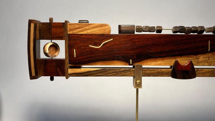 Darrel Nelson, “Human Experience Gauge (detail),” rosewood, poplar, mixed hardwood, brass, 2024