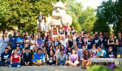 International students near Augustana's Ole statue
